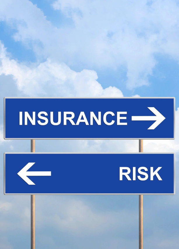 A blue sign with two different directions of insurance and risk.